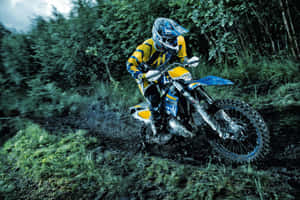 Husqvarna Motorcycle Offroad Action Wallpaper