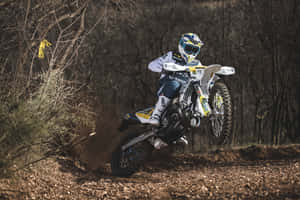 Husqvarna Motorcycle Offroad Action Wallpaper