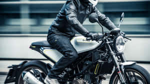 Husqvarna Motorcycle Riderin Action Wallpaper