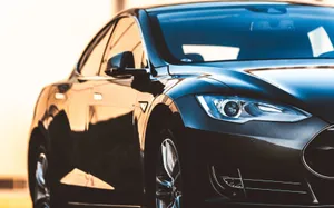 Hybrid Car On The Road Wallpaper