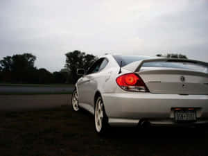 Hyundai Tiburon Sporty Coupe On The Road Wallpaper