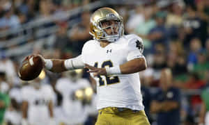 Ian Book Notre Dame Quarterback Action Shot Wallpaper