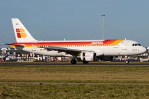 Iberia Airlines Airplane On Grassland Wallpaper
