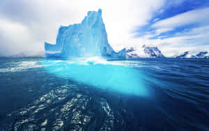 Iceberg Floating In The Ocean Wallpaper