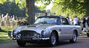 Iconic Aston Martin Db5 In Its Full Glory. Wallpaper