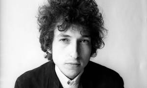 Iconic Black And White Portrait Of Renowned Musician Bob Dylan Wallpaper