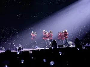 Iconic Bts Performance On Concert Stage Wallpaper
