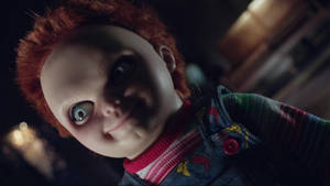 Iconic Chucky Doll From The Child's Play Series Wallpaper