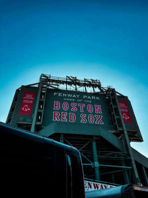 Iconic Fenway Park At Night Wallpaper