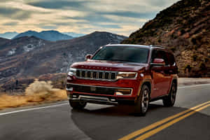 Iconic Jeep Wagoneer On A Scenic Adventure Wallpaper