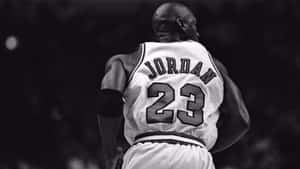 Iconic Michael Jordan Jersey And Cap Wallpaper