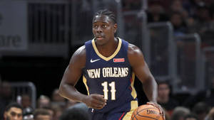 Iconic Nba Star Jrue Holiday Wallpaper