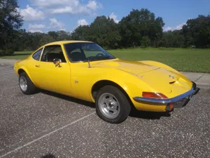 Iconic Opel Gt On The Highway Wallpaper