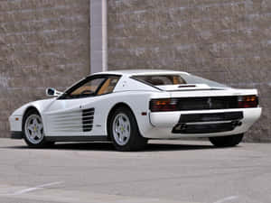 Iconic Red Ferrari Testarossa In Action Wallpaper