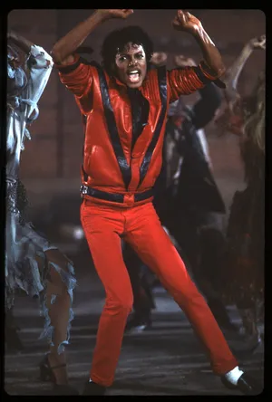 Iconic_ Red_ Jacket_ Dance_ Pose Wallpaper