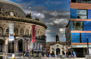 Iconic Sunset Over Leeds Skyline Wallpaper