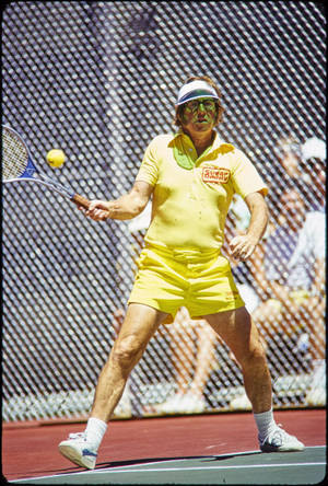 Iconic Tennis Legend Bobby Riggs In Action Wallpaper