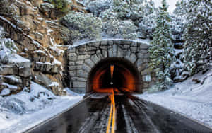 Icy Road In Winter Landscape Wallpaper