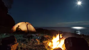 Idyllic Beach Camping Experience Wallpaper