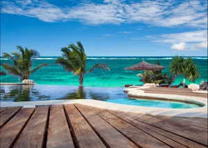 Idyllic Beach Swimming Pool Wallpaper