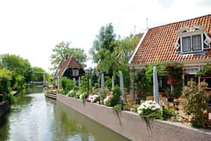 Idyllic Canal Scene Breda Netherlands Wallpaper