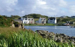 Idyllic Coastal Village: A Serene Capture Wallpaper