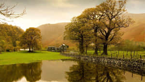 Idyllic Countryside Farmhouse Wallpaper