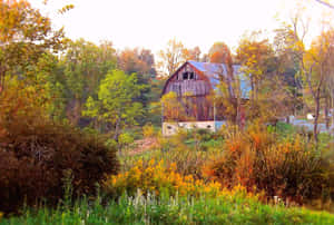 Idyllic Fall Farmhouse Scene Wallpaper