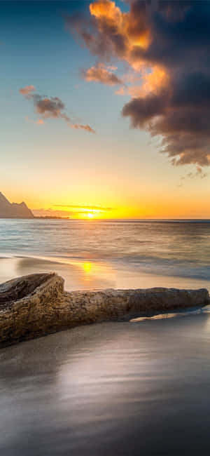 Idyllic Yellow Beach At Sunset Wallpaper