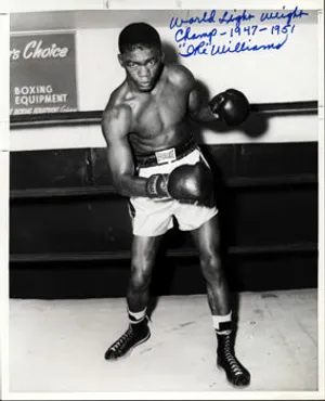 Ike Williams During A Championship Boxing Match Wallpaper