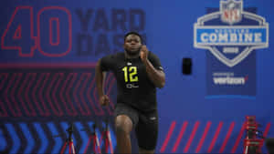 Ikem Ekwonu Running For Yard Dash Wallpaper