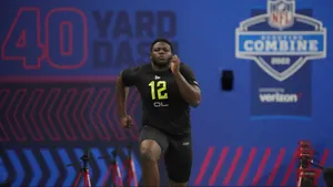 Ikem Ekwonu Running For Yard Dash Wallpaper