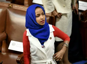 Ilhan Omar Adjusting Her Ribbon Belt Wallpaper