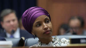 Ilhan Omar In A Congress Hearing Wallpaper