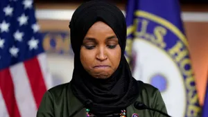 Ilhan Omar Looking Down Wallpaper