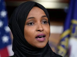 Ilhan Omar Speaking At An Event Wallpaper