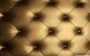 Illuminate The Room With Gleaming Bronze Wallpaper