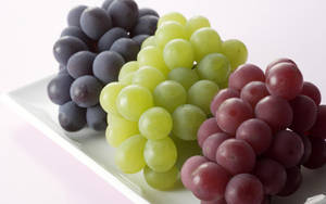 Illuminated Bunch Of Grapes Wallpaper