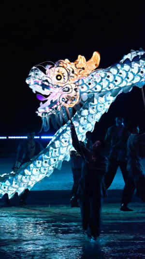 Illuminated Dragon Dance Performance Wallpaper