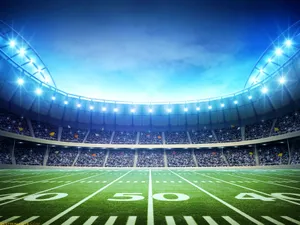 Illuminated Football Stadiumat Night.jpg Wallpaper