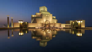 Illuminated Museum Of Islamic Art At Night Wallpaper