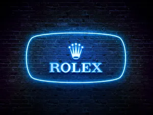 Illuminated Neon Text Against Dark Backdrop Wallpaper