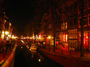 Illuminated Nightlife In The Red Light District Wallpaper