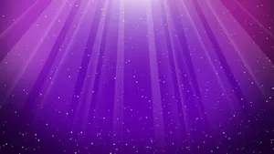 Illuminated Purple Hues In A Dreamy Swirl Wallpaper