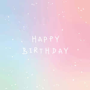 Image A Beautiful Pink Birthday Cupcake With Sprinkles Wallpaper