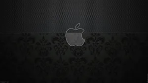 Image A Sleek Black Macbook Laptop, Perfect For Professionals And Creatives Wallpaper