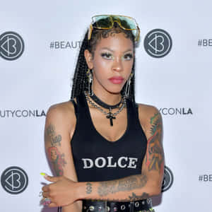 Image American Rapper Rico Nasty Performing On Stage Wallpaper