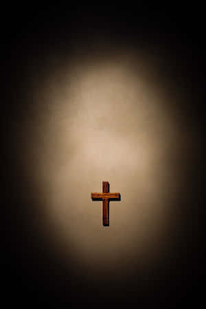 Image An Ethereal Image Of A Cross Silhouetted Against The Sky. Wallpaper