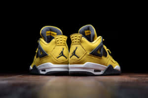 Image Brighten Your Street Style With These Lit Yellow Jordan Sneakers Wallpaper