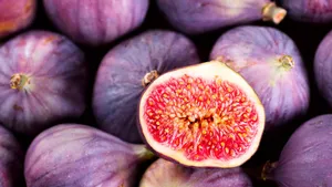 Image Freshly Harvested Purple Figs, Nature's Delicious Treat Wallpaper